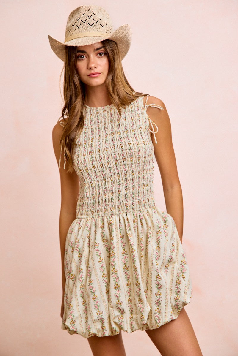 Ivory BiBi floral bow tie attachable puff sleeves dress by Trendsi, featuring a feminine floral pattern and stylish puff sleeves.