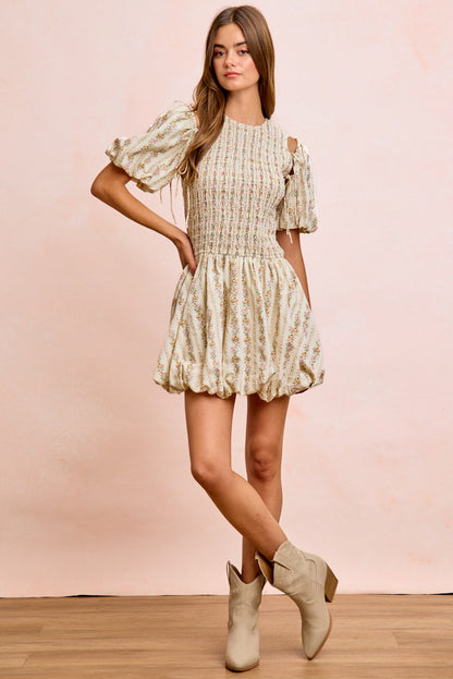 Ivory BiBi floral bow tie attachable puff sleeves dress by Trendsi, featuring a fitted bodice, floral pattern, and elegant puff sleeves.