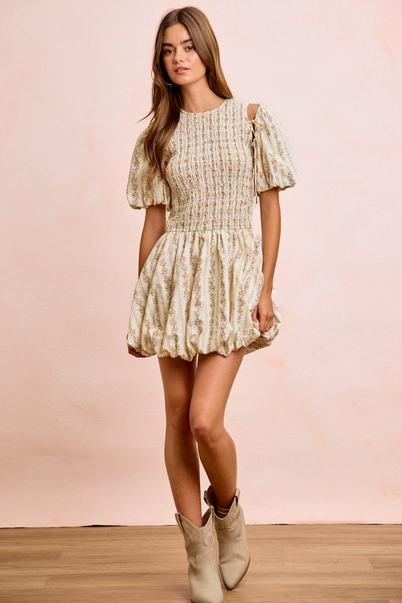 Ivory BiBi Floral Bow Tie Attachable Puff Sleeves Dress by Trendsi, featuring a floral pattern and elegant puff sleeves.