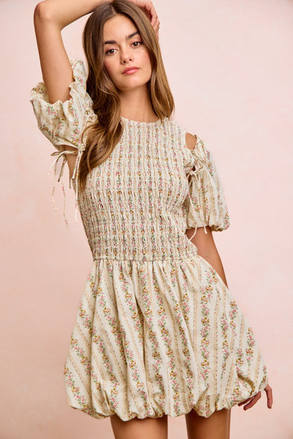 Ivory BiBi floral bow tie attachable puff sleeves dress by Trendsi, featuring a feminine design with floral pattern and puff sleeves.