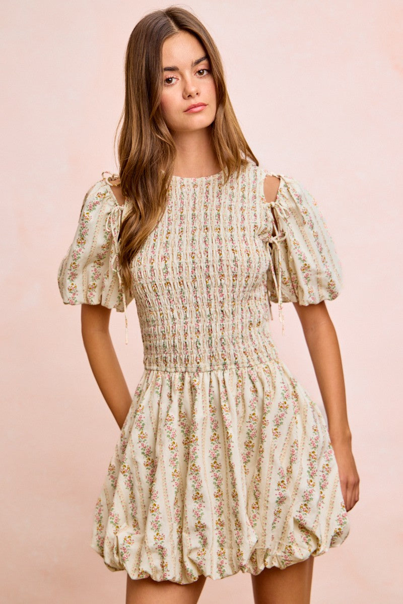 Ivory BiBi floral bow tie dress with attachable puff sleeves, featuring a stylish and feminine design by Trendsi.