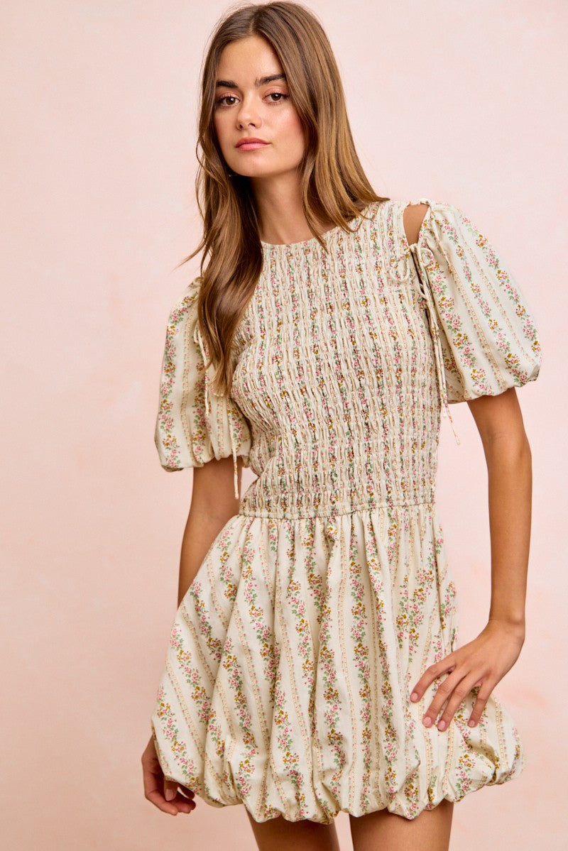 Ivory floral bow tie attachable puff sleeves dress by Trendsi, featuring a feminine silhouette and delicate floral pattern.