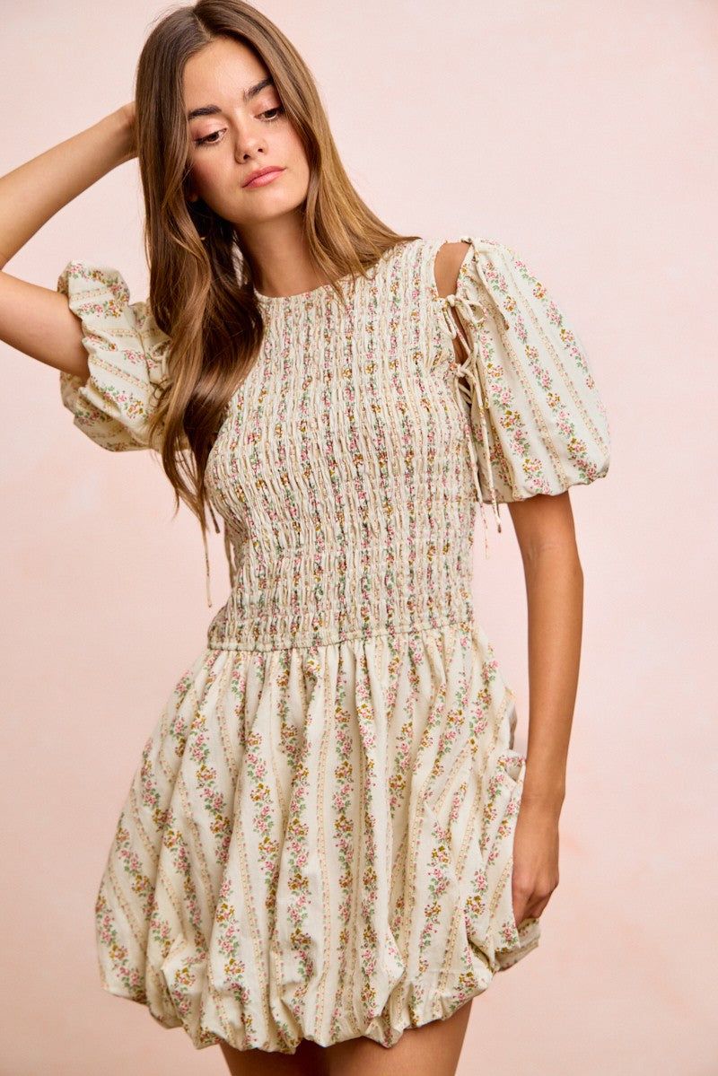 Ivory BiBi floral bow tie attachable puff sleeves dress by Trendsi, with a fitted bodice and feminine floral pattern.