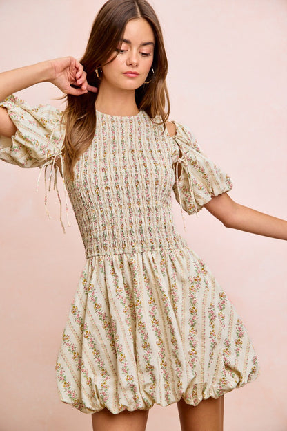 Ivory floral bow tie attachable puff sleeves dress by Trendsi, featuring a fitted bodice and flowy skirt with delicate floral print.