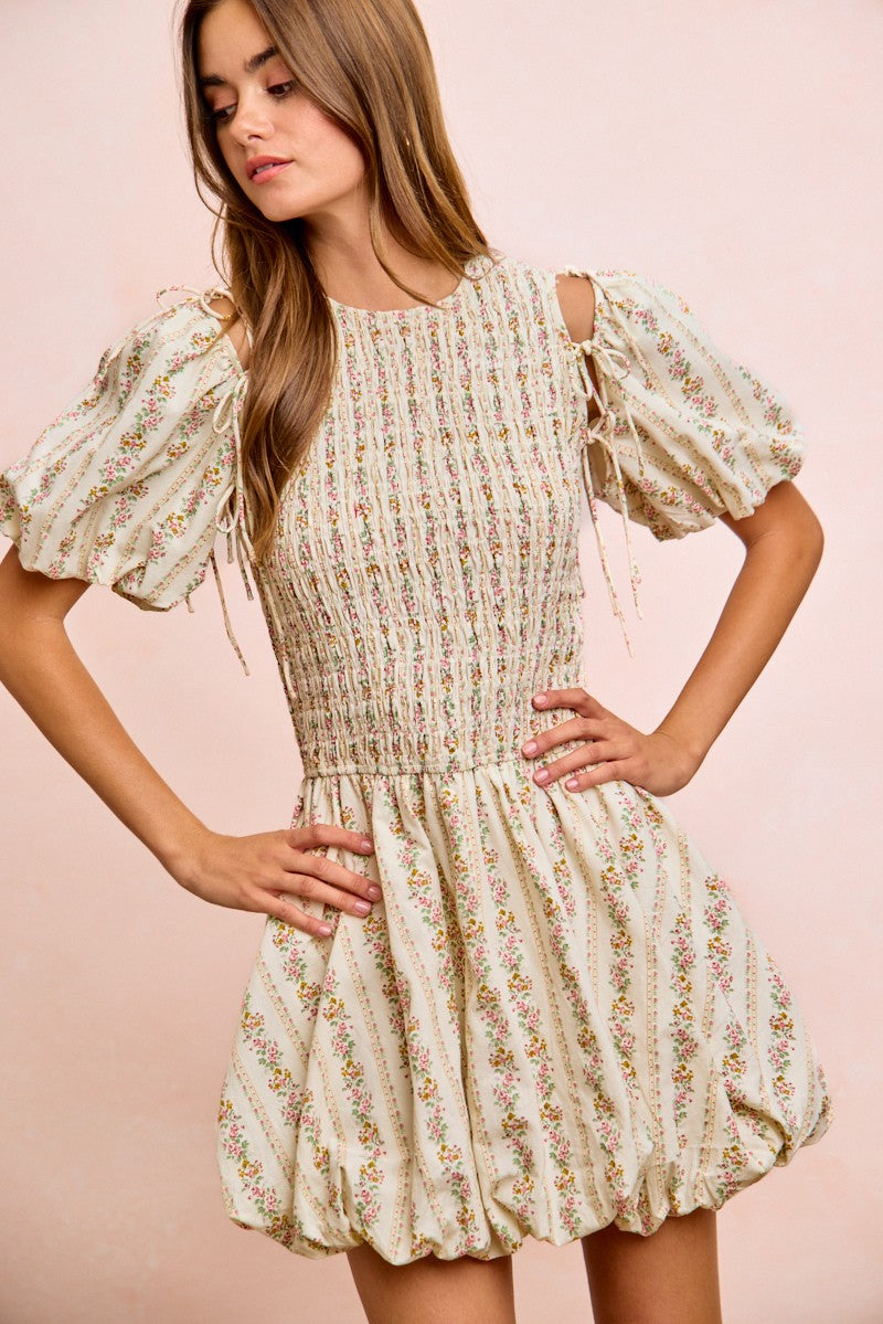 Ivory floral bow tie attachable puff sleeves dress by Trendsi with a flattering fit and elegant floral pattern.