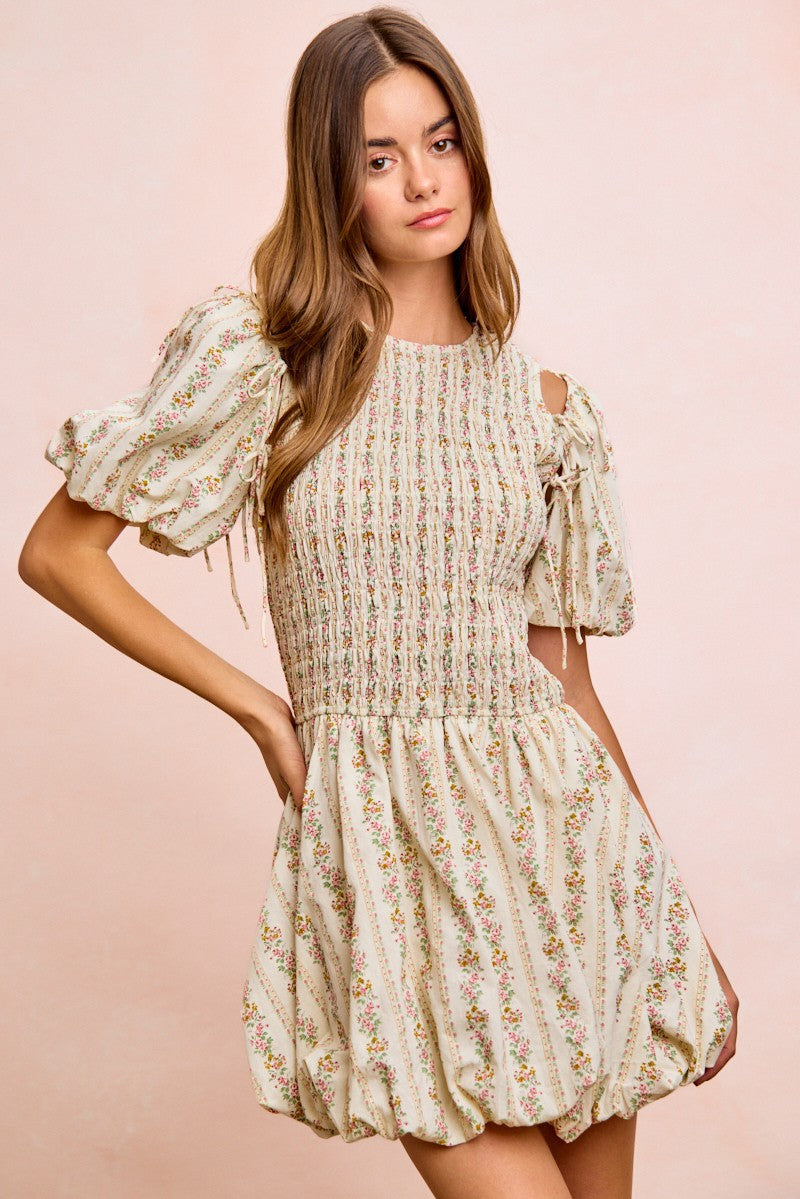 Ivory floral bow tie attachable puff sleeves dress by Trendsi, featuring a feminine design with puffed sleeves and bow accents.