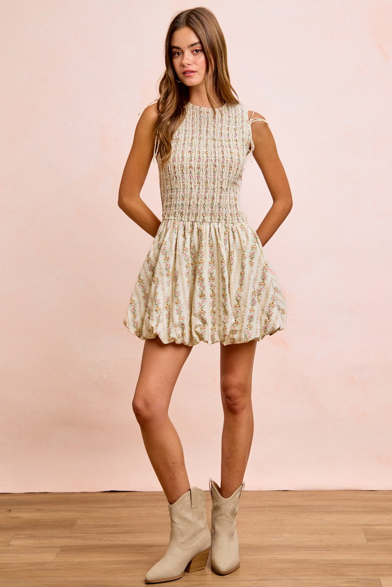 Ivory floral bow tie attachable puff sleeves dress by Trendsi featuring a feminine design and elegant floral pattern.