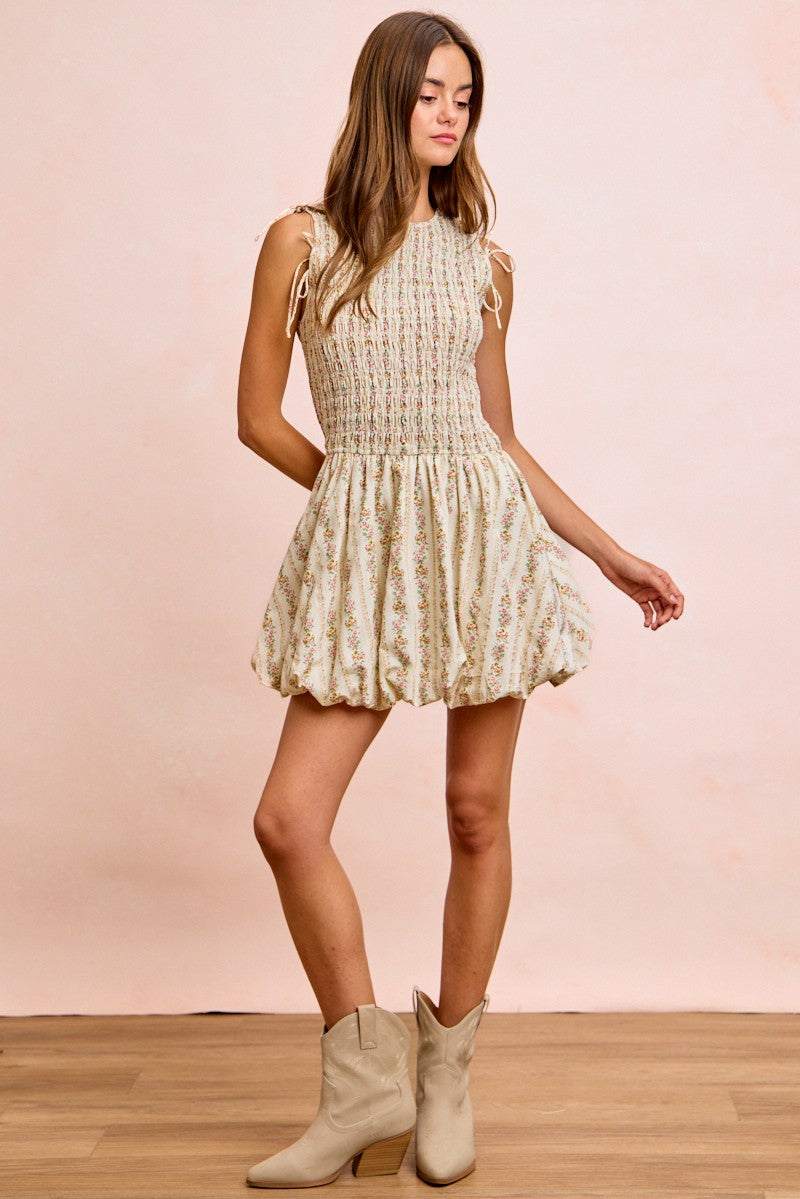 Ivory BiBi floral bow tie attachable puff sleeves dress by Trendsi, featuring a feminine floral pattern and elegant puff sleeve design.
