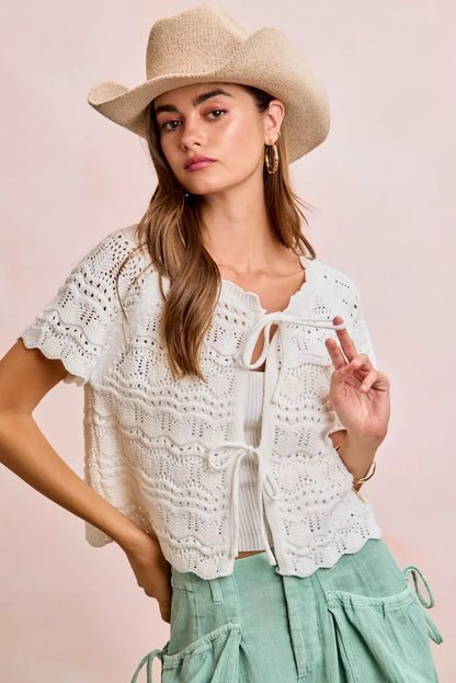 Ivory Trendsi BiBi front bow tie detail pointelle knit top, close-up of the stylish neckline and intricate knit pattern.