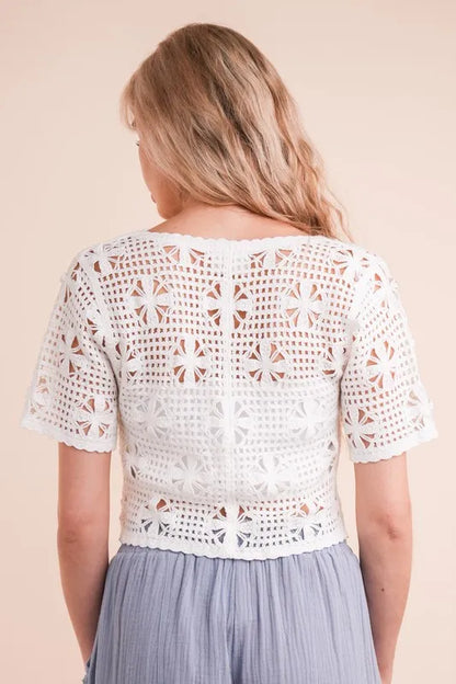 Ivory front tie crochet crop top from Very J by Trendsi, featuring a stylish front tie and intricate crochet design.