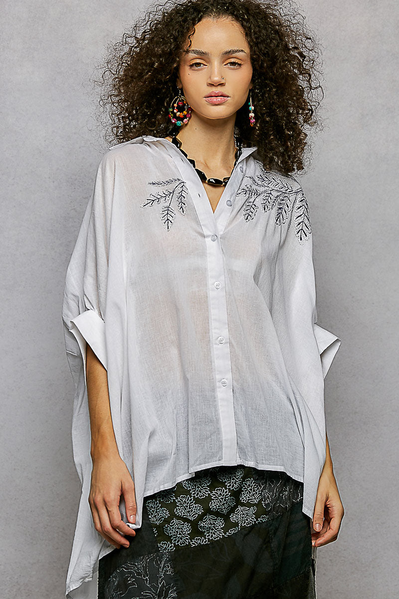 Ivory POL button-down shirt by Trendsi with embroidered floral design and high-low hem, casual and stylish for everyday wear.