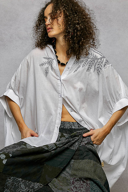 Ivory POL button-down floral embroidered high-low hem shirt by Trendsi, featuring intricate embroidery and a stylish high-low cut.