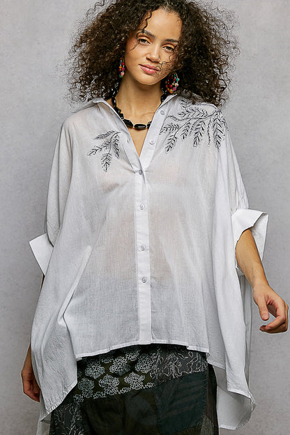 Ivory POL button-down shirt by Trendsi with embroidered floral design and high-low hem, casual and stylish for everyday wear.