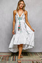 Ivory midi tiered cami dress by Trendsi with embroidered details, tassel tie, smocked waist, and sleeveless design.