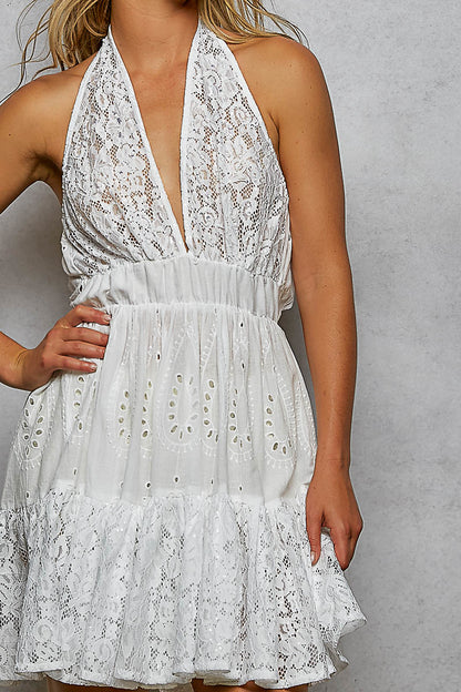 Ivory POL Halter Lace Patch Ruffle Mini Dress with adjustable tie on back, by Trendsi, featuring lace details and ruffle accents.