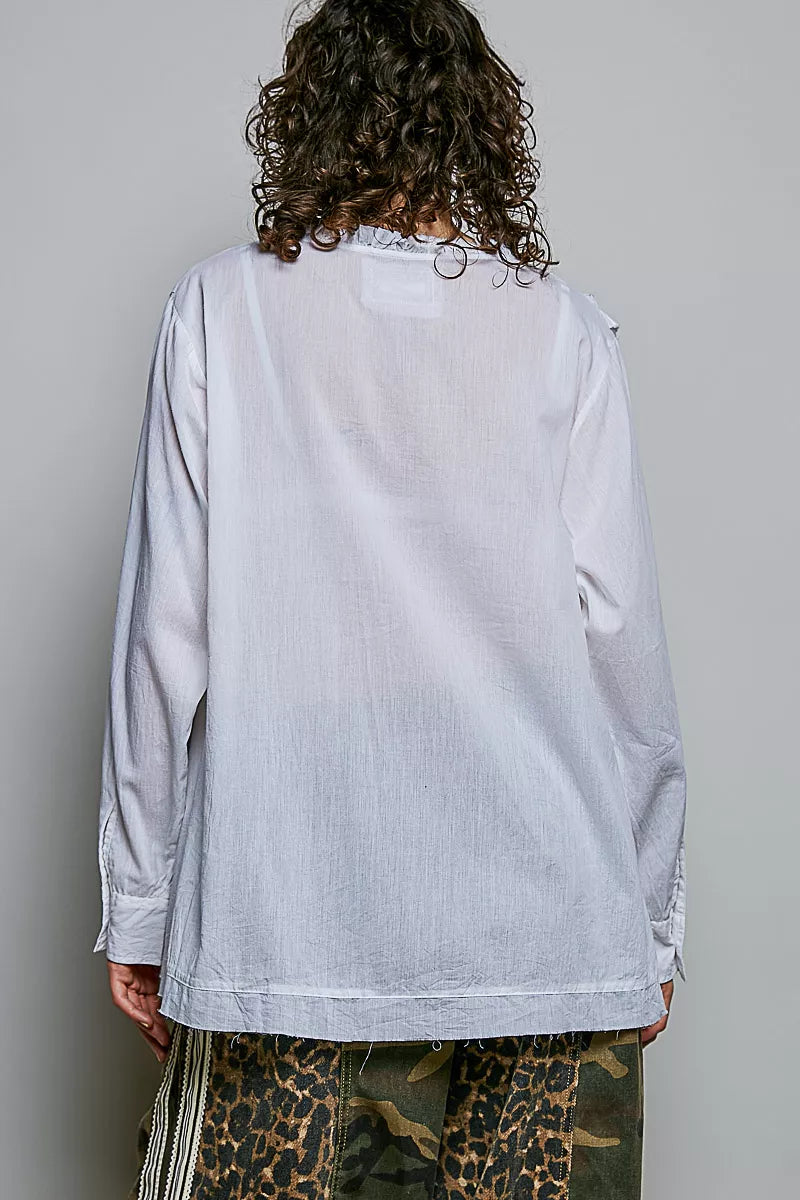 Ivory lightweight woven shirt by Trendsi with ruffle trim and round neckline, perfect for casual or dressy occasions.