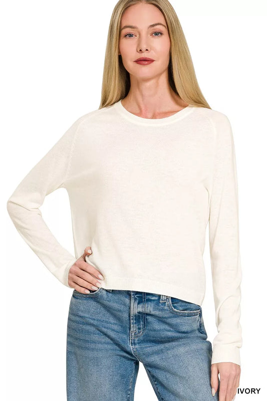 Ivory Zenana lightweight wool blend round neck sweater by Trendsi, showcasing a cozy, soft knit with a classic fit.