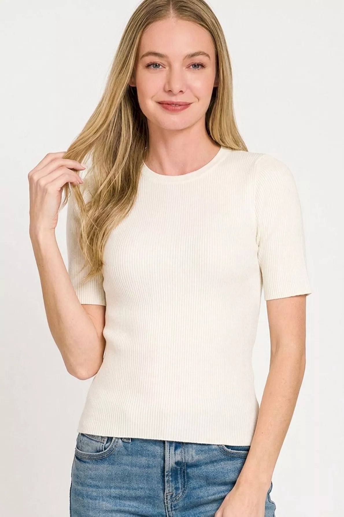 Ivory Zenana Viscose Ribbed Round Neck Sweater with long sleeves, soft knit, and ribbed texture, styled casually.