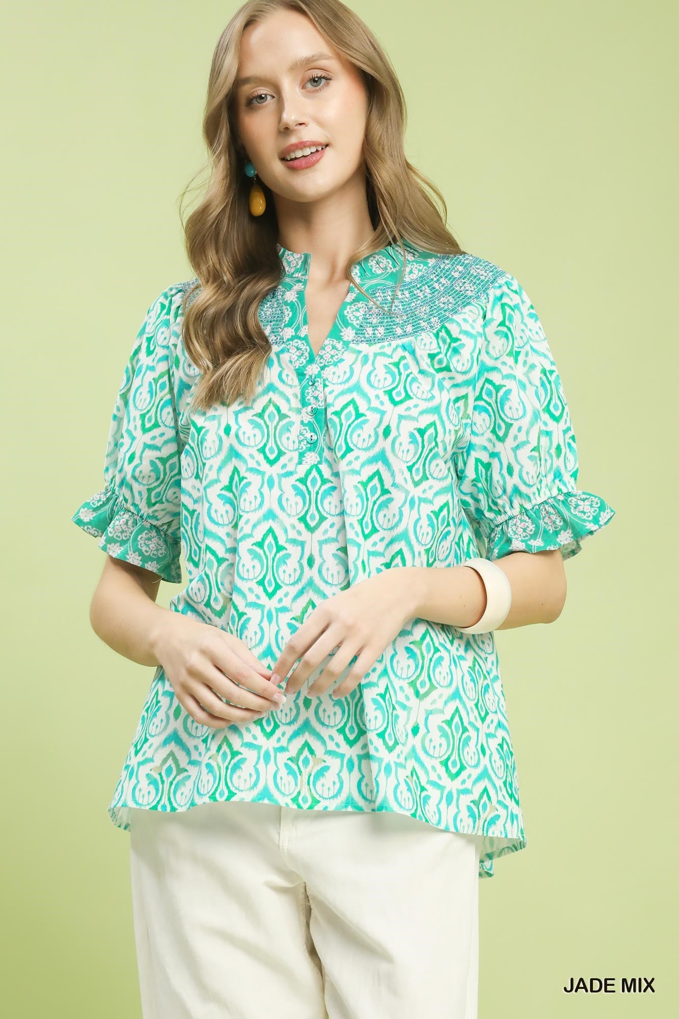 Umgee boho puff sleeve smocked top with mixed fabric and relaxed fit, featuring a stylish, casual design for trendy looks.