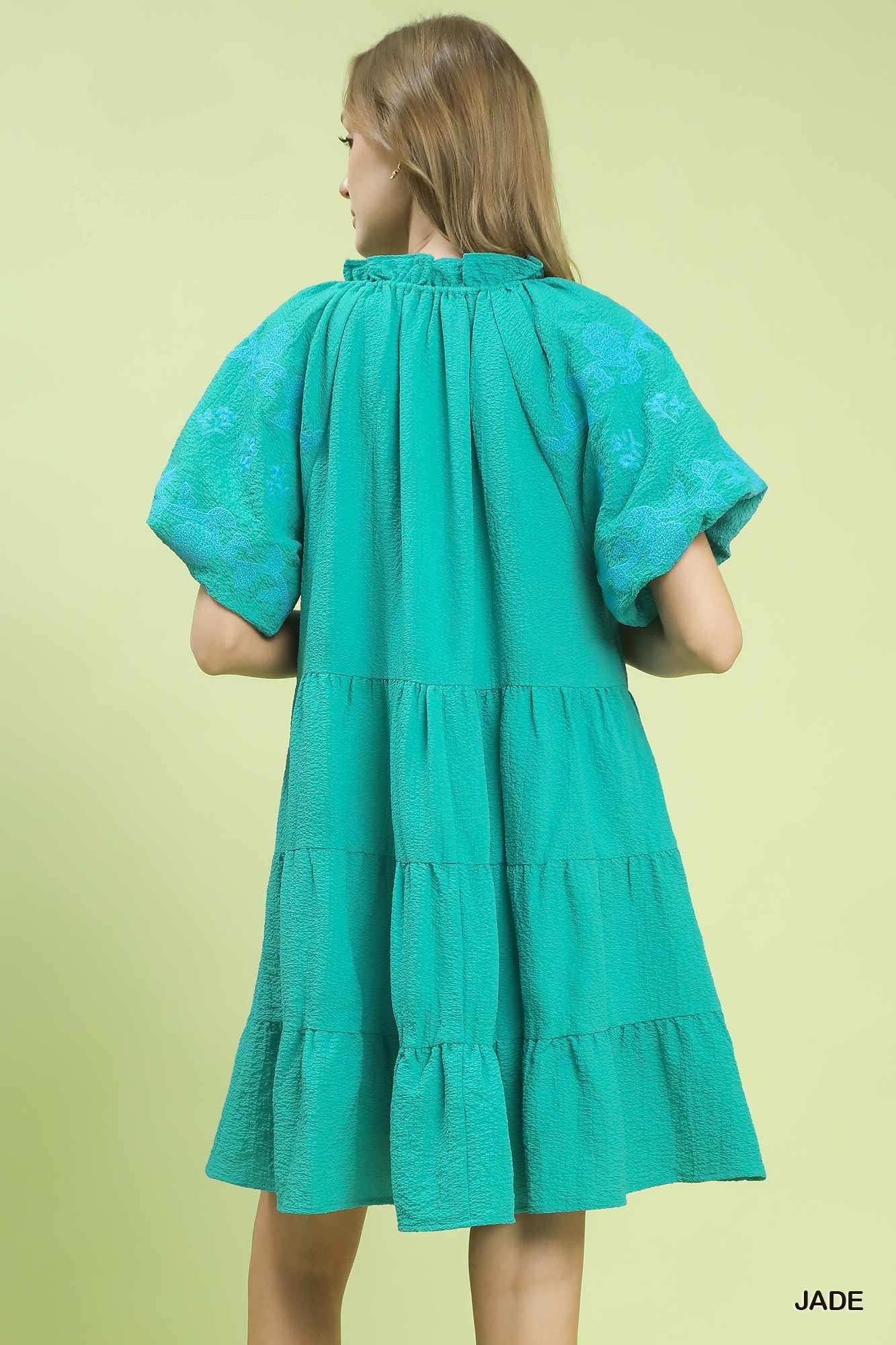 Umgee embroidered tiered puff sleeve mini dress featuring floral embroidery and a flowy silhouette, perfect for casual or dressy occasions.