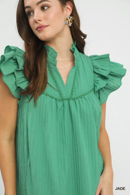 Umgee Flutter Sleeve Tiered Dress by Trendsi, featuring a flowy silhouette with flutter sleeves and tiered design in soft fabric.