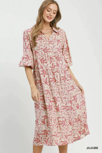 Umgee Linen Botanical Print Tiered Midi Dress with sleeveless design and flowy silhouette, featuring a vibrant floral pattern.