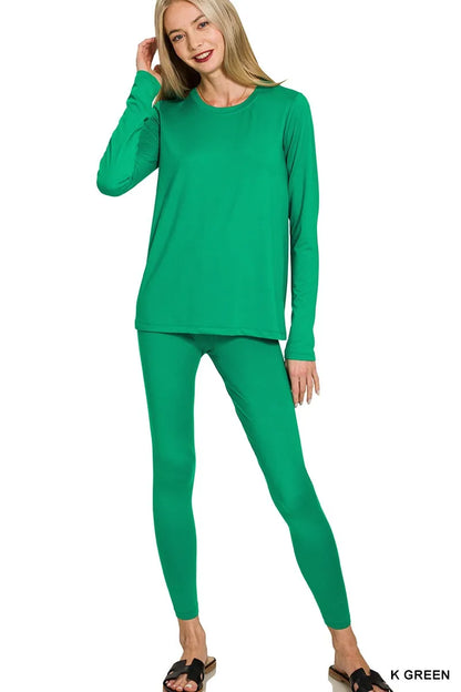 Green Zenana microfiber round neck top and leggings set from Trendsi, featuring a comfortable fit and casual style.