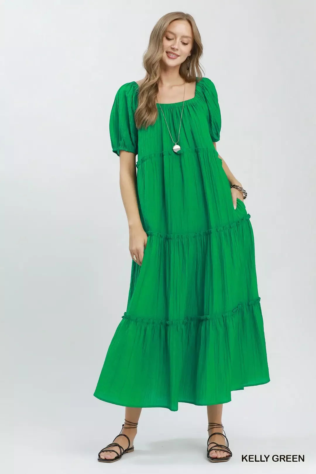 Kelly green Umgee textured tiered midi dress with a flowy silhouette and layered design, perfect for casual or semi-formal occasions.