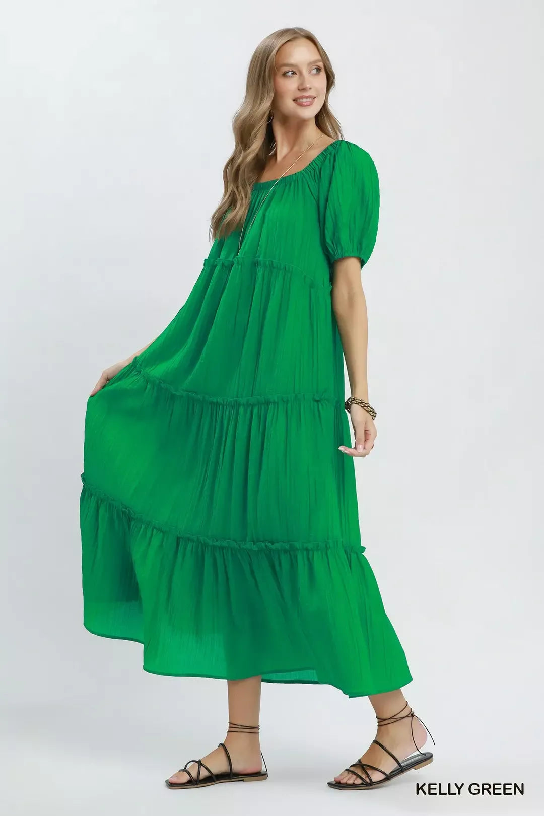 Kelly green Umgee textured tiered midi dress with ruffled layers, sleeveless design, and flowy silhouette.