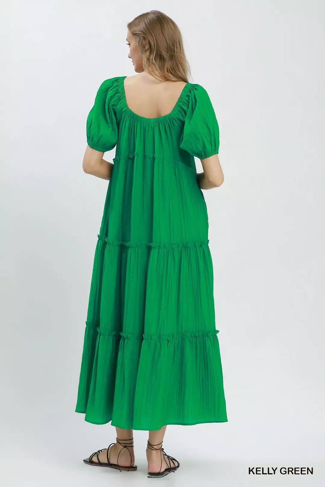 Kelly green Umgee textured tiered midi dress with a flowing silhouette and layered design, perfect for casual or semi-formal wear.