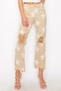 Risen high-rise star-printed frayed hem jeans in khaki, showcasing a full-size fit with distressed detailing and casual style.