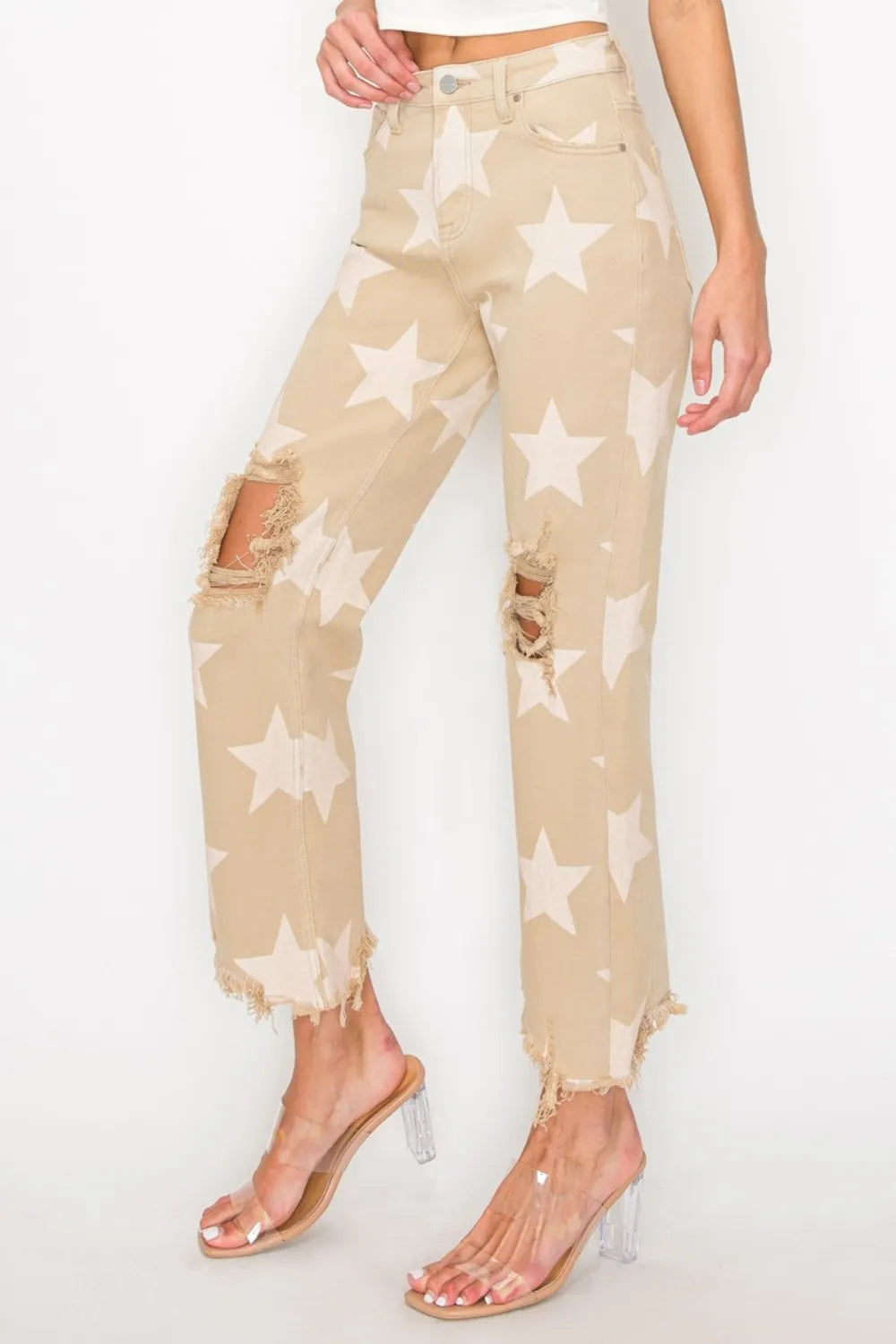 Risen full-size high-rise star printed frayed hem jeans in khaki, featuring a distressed denim style and trendy design.