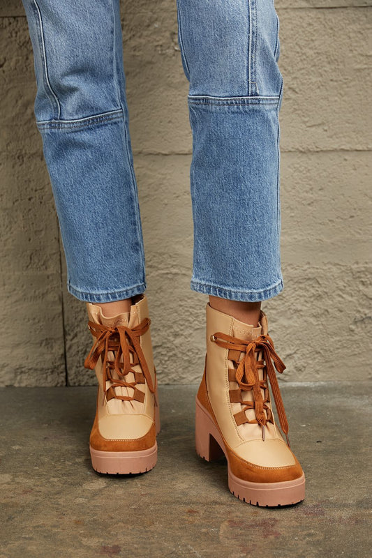 Khaki East Lion Corp lace-up lug booties with chunky soles and metal eyelets, stylish ankle boots from Trendsi.