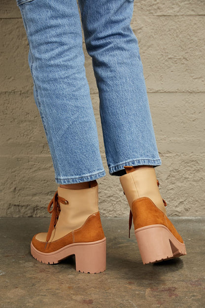 Khaki East Lion Corp lace-up lug booties with chunky soles and ankle height, stylish and durable for casual wear.