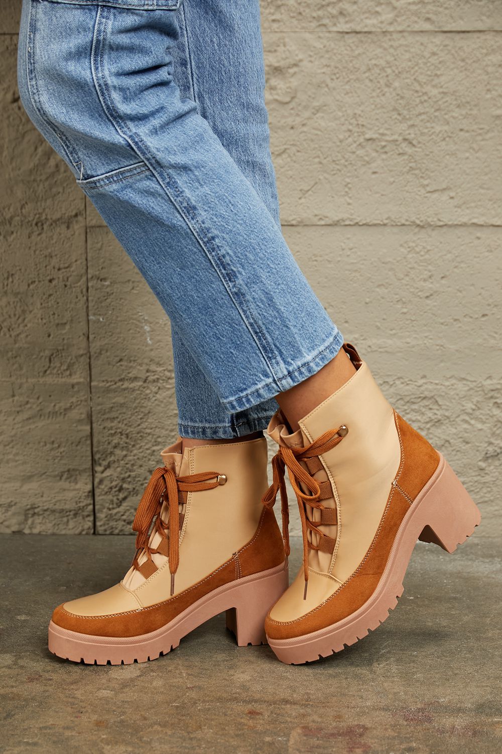 Khaki East Lion Corp lace-up lug booties with chunky sole and ankle height, stylish footwear by Trendsi.