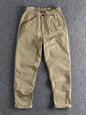 Men's plus size casual cargo pants with elastic waistband in khaki, from Trendsi, featuring multiple pockets and relaxed fit.