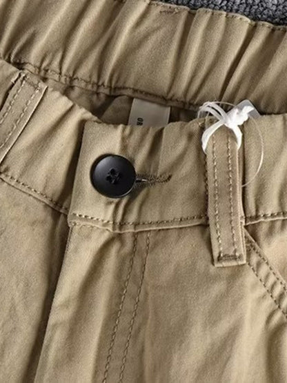 Men's plus size casual cargo pants with elastic waist in khaki, featuring multiple pockets, from Trendsi.