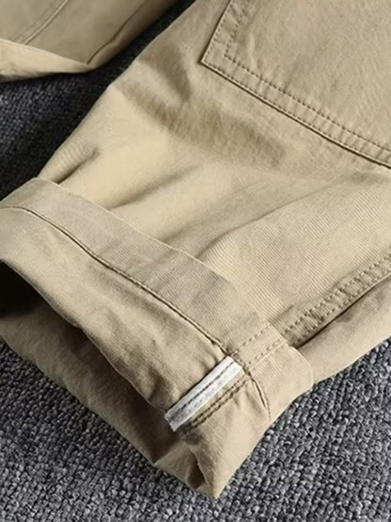 Men's plus size casual cargo pants with elastic waistband in khaki, designed for comfort and style by Trendsi.