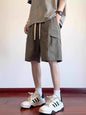 Men's plus size khaki cargo shorts with drawstring waist and relaxed fit, designed for comfort and casual style.