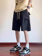 Men's plus size khaki drawstring cargo shorts with relaxed fit, featuring multiple pockets and casual style from Trendsi.
