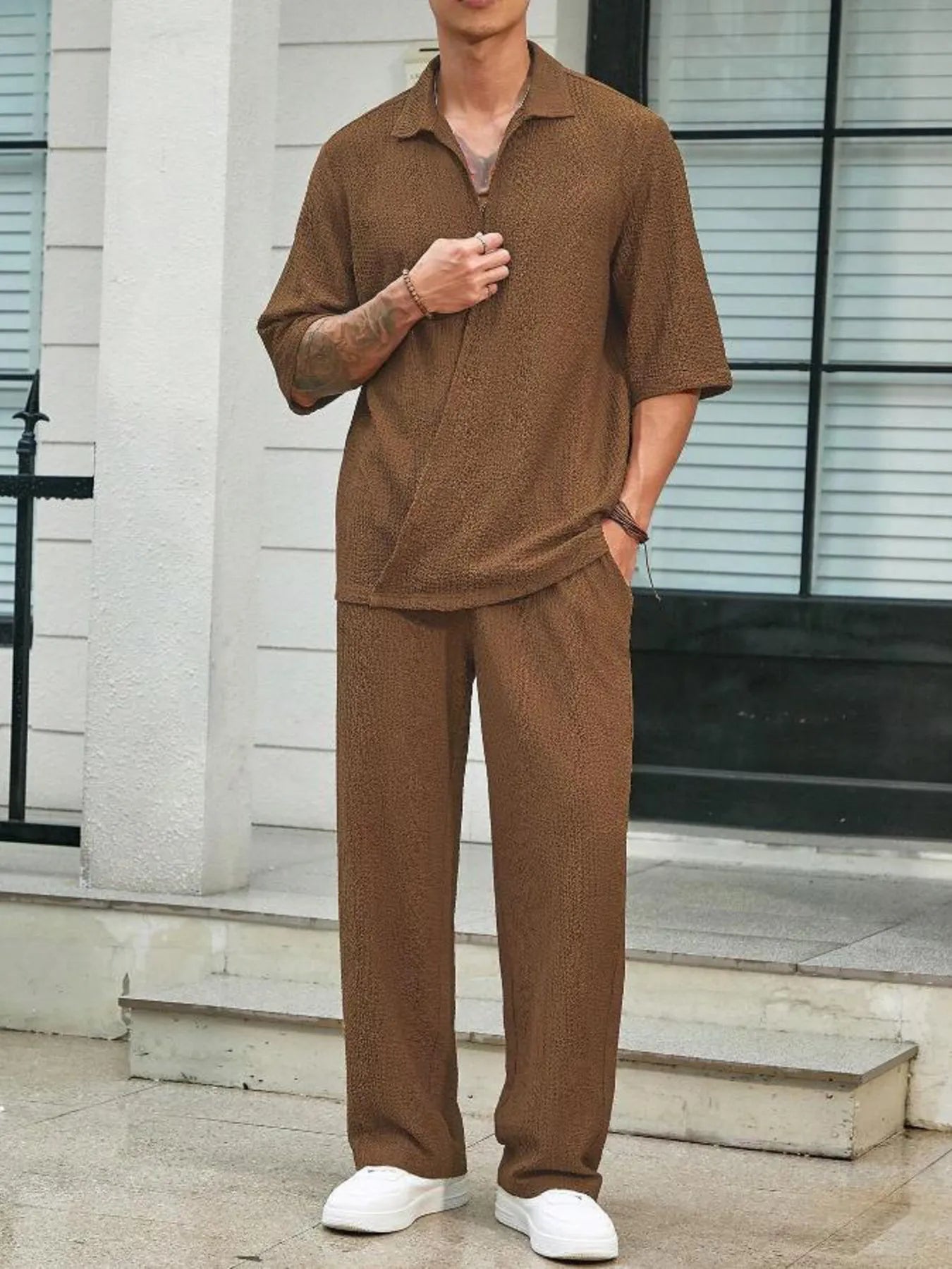 Men's plus size khaki half sleeve top and matching pants set by Trendsi, casual fit, comfortable fabric, front view.