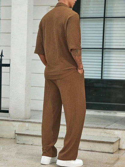 Men's plus size khaki half sleeve top and pants set by Trendsi, casual outfit with comfortable fit and stylish design.