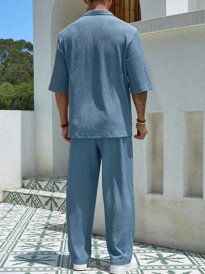 Men's plus size khaki half sleeve top and pants set by Trendsi, casual matching outfit with comfortable fit and relaxed style.