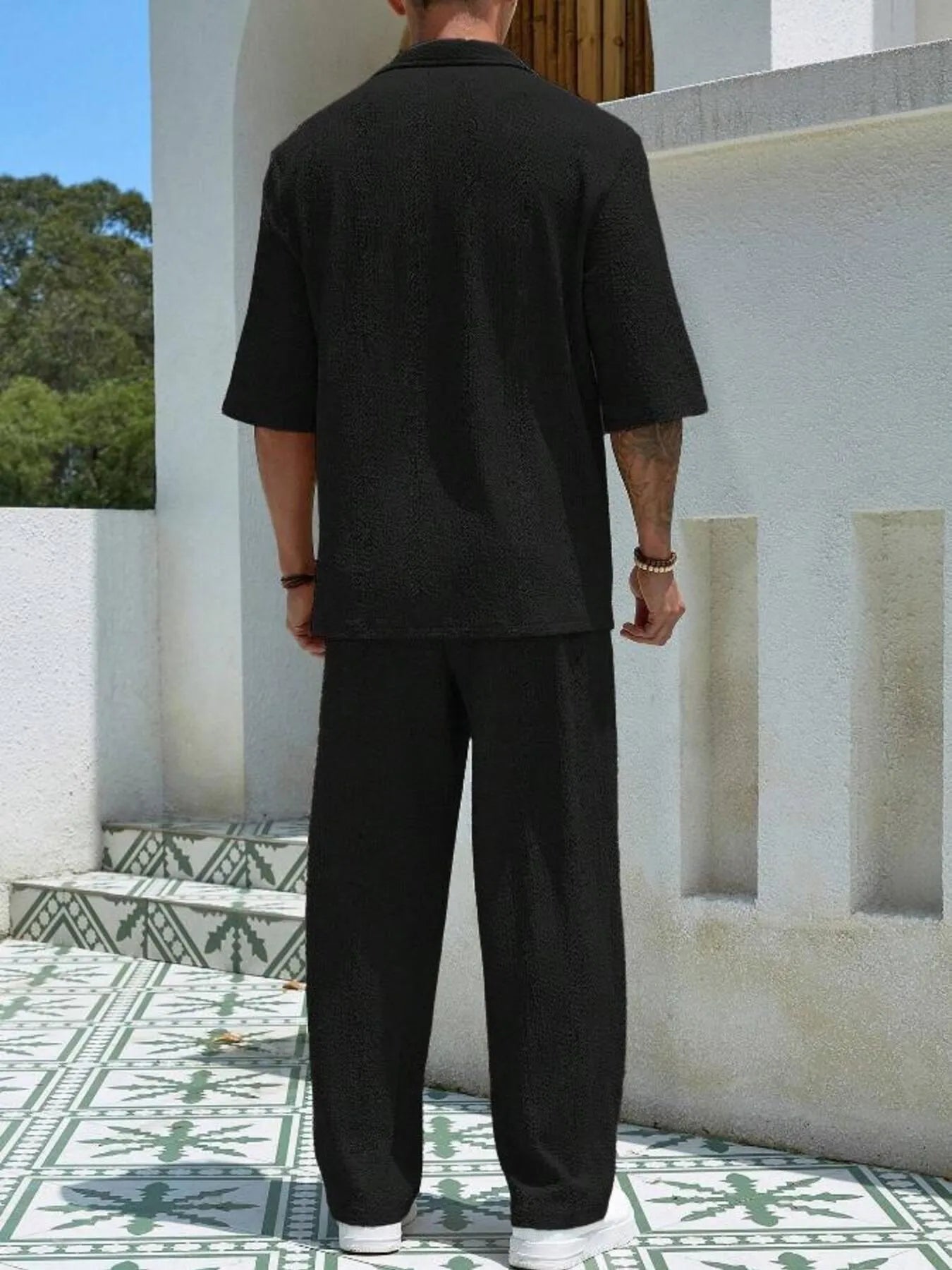 Men's plus size khaki half-sleeve top and pants set by Trendsi, casual outfit with relaxed fit and comfortable fabric.