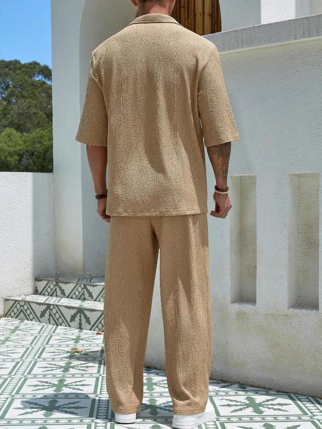 Men's plus size khaki half sleeve top and pants set from Trendsi, casual style, front view showing fit and fabric details.