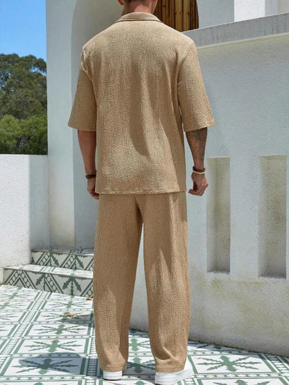 Men's plus size khaki half sleeve top and pants set from Trendsi, casual style, front view showing fit and fabric details.
