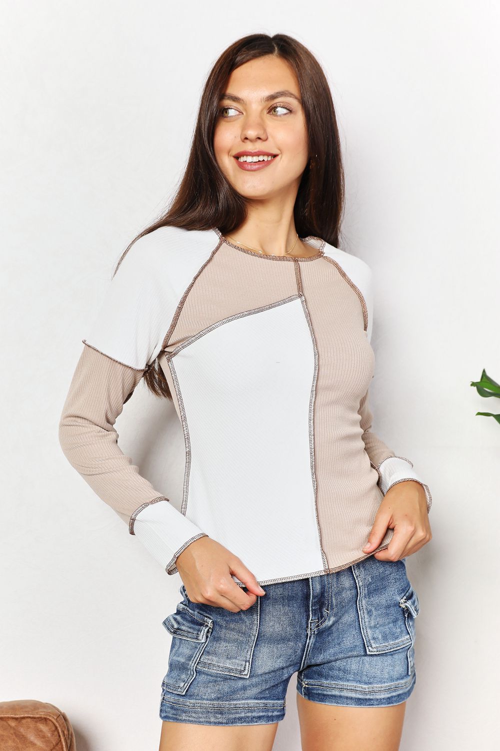 Khaki double take color block exposed seam top by Trendsi, featuring a stylish design and visible seam details.