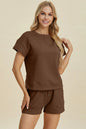 Trendsi khaki double take full-size textured short sleeve top and matching shorts set, casual summer outfit on a model.