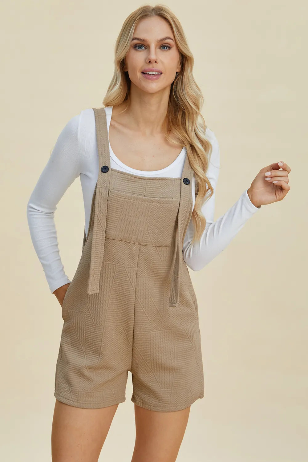 Khaki sleeveless romper with textured fabric from Trendsi, featuring a double take full size design and a relaxed fit.