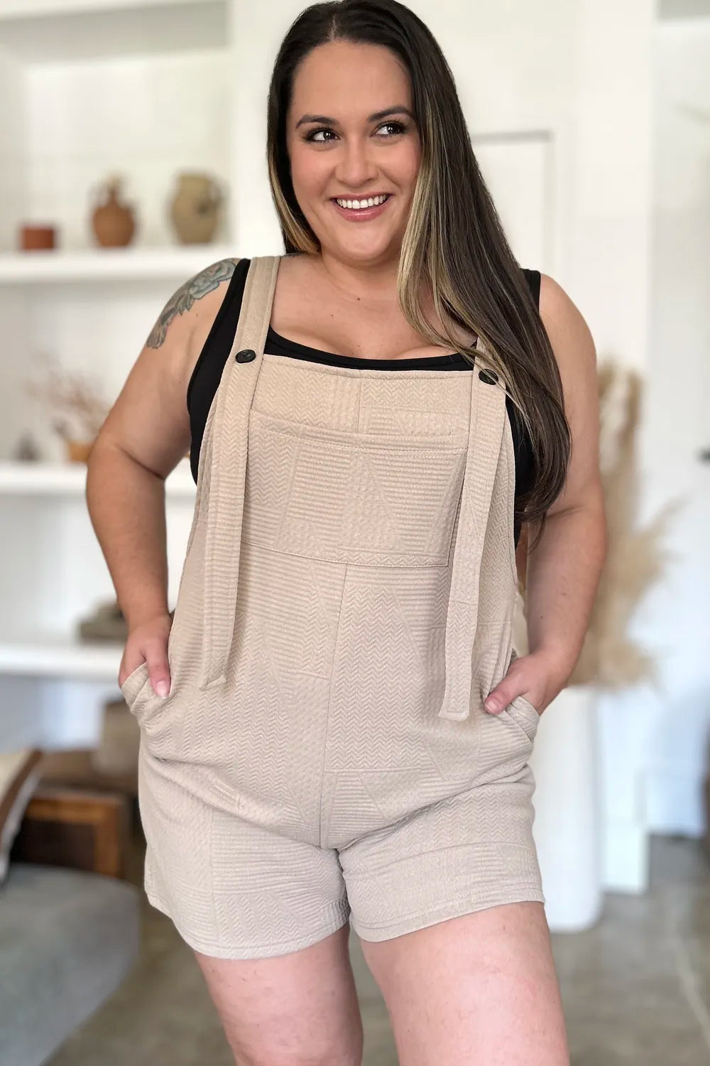 Khaki sleeveless romper with textured fabric, full size, from Trendsi's Double Take collection, featuring a casual and stylish design.